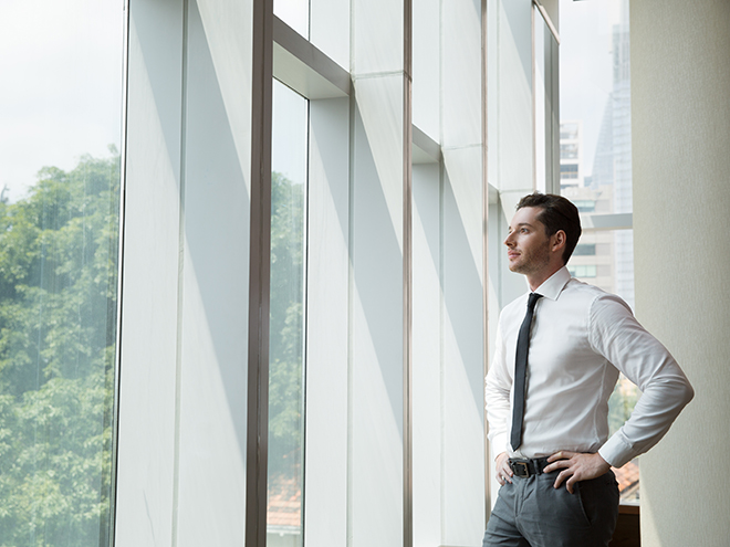 Portrait of Businessman at Window 4